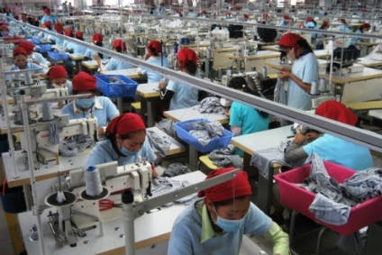 Cambodia worker wages threatened by low garment prices