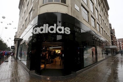 Adidas Q3 profit slides on continuing Russia weakness
