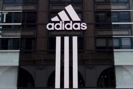 Adidas hits updated full-year sales targets