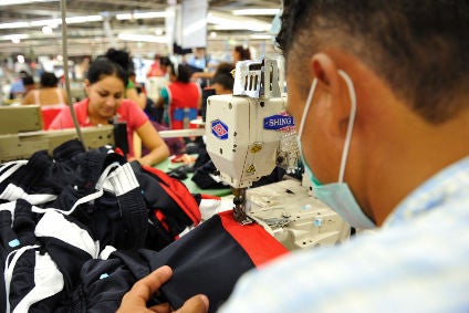 Virus seen halving Central American garment exports